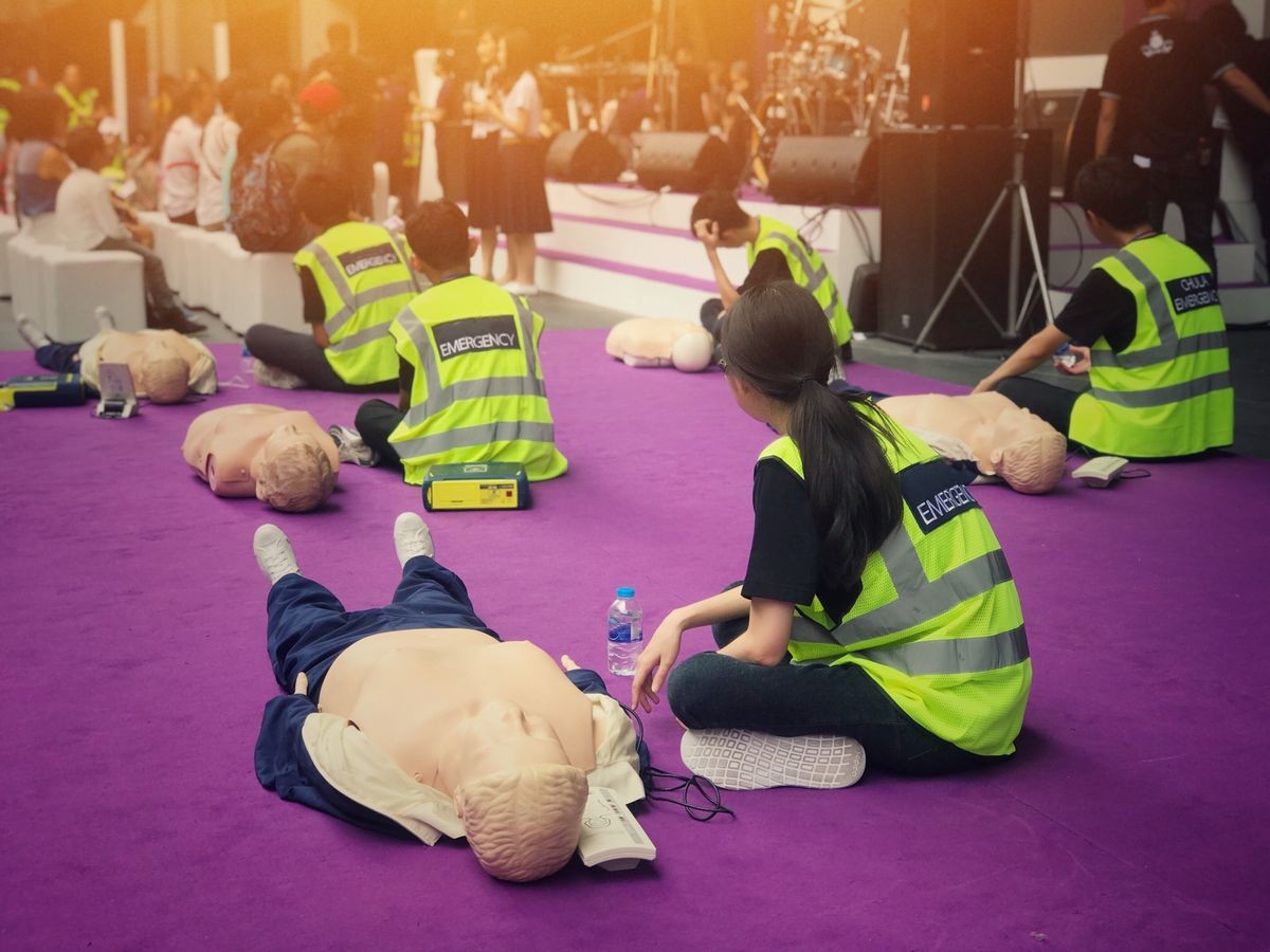 CPR training to people on the stage